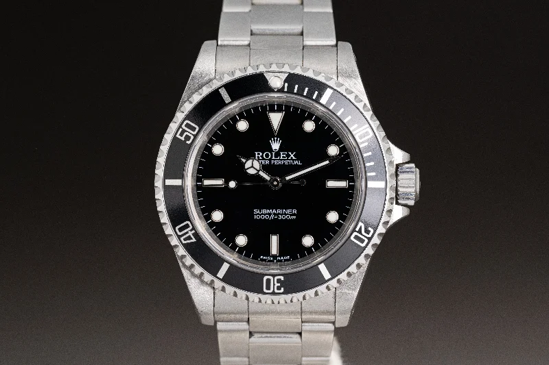 Shop Rolex Watches for Precision and Style –2004 Rolex 40mm Submariner 14060M  Box, Papers, Chronotag, Wallet & Booklets