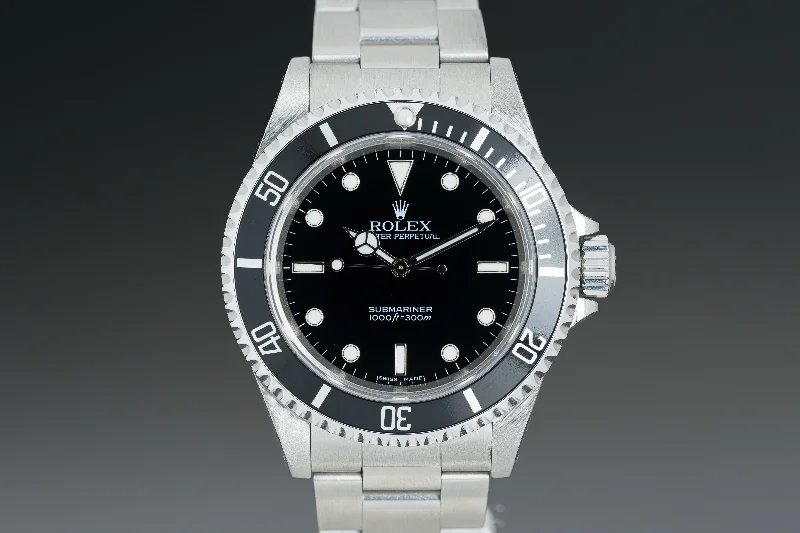 Rolex Watches: A Legacy of Craftsmanship –2005 Rolex 14060M Submariner 14060M Box, Papers & Wallet