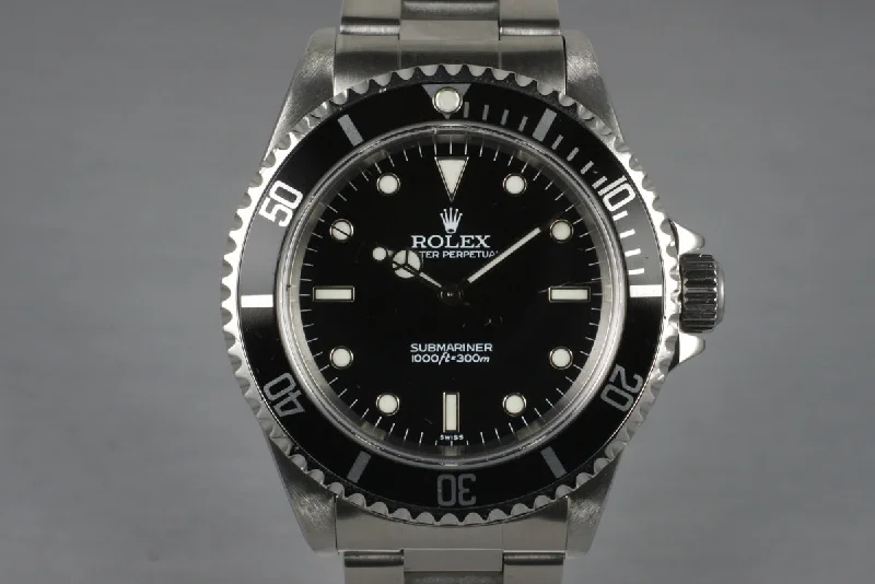 Shop Luxury Rolex Timepieces for Every Style –1999 Rolex Submariner 14060 with Box and Papers